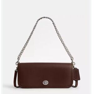 Coach Dinky should purse brown. MISSING SILVER CHAIN. New with imperfection
